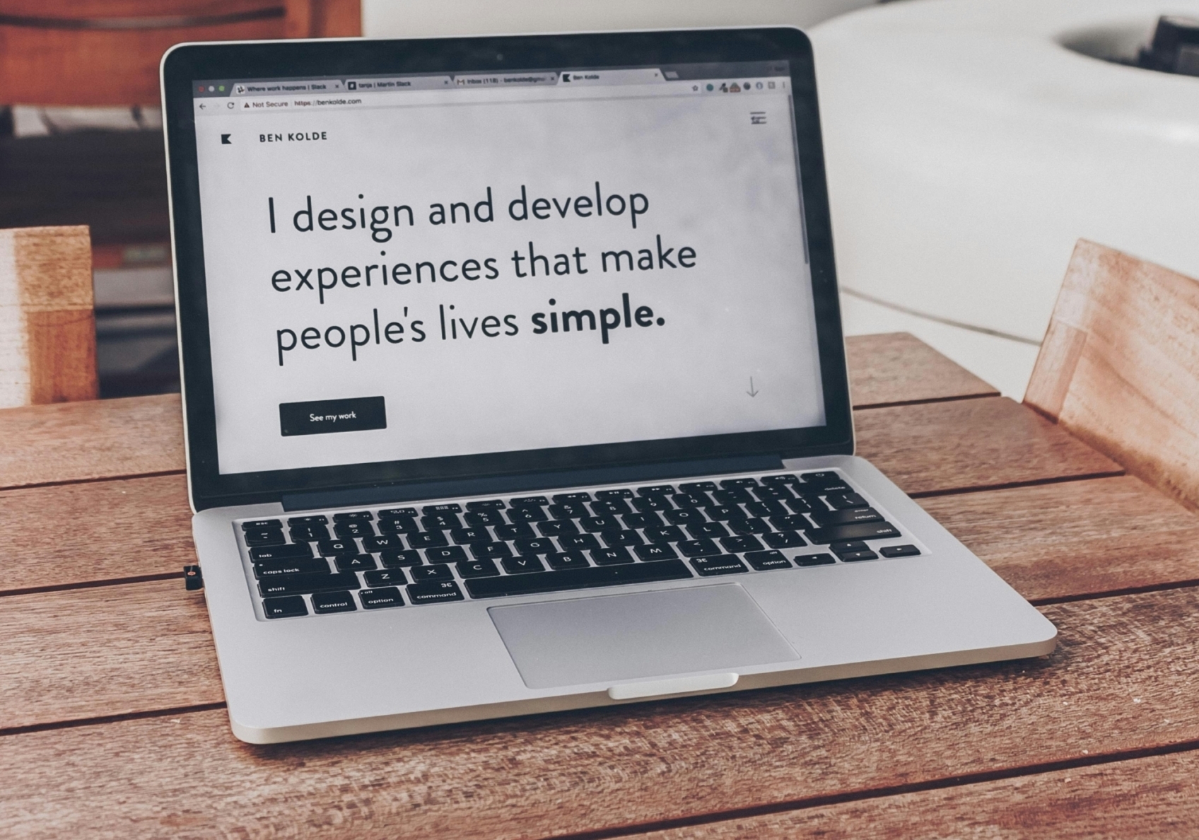 An open laptop displaying a website about web design
